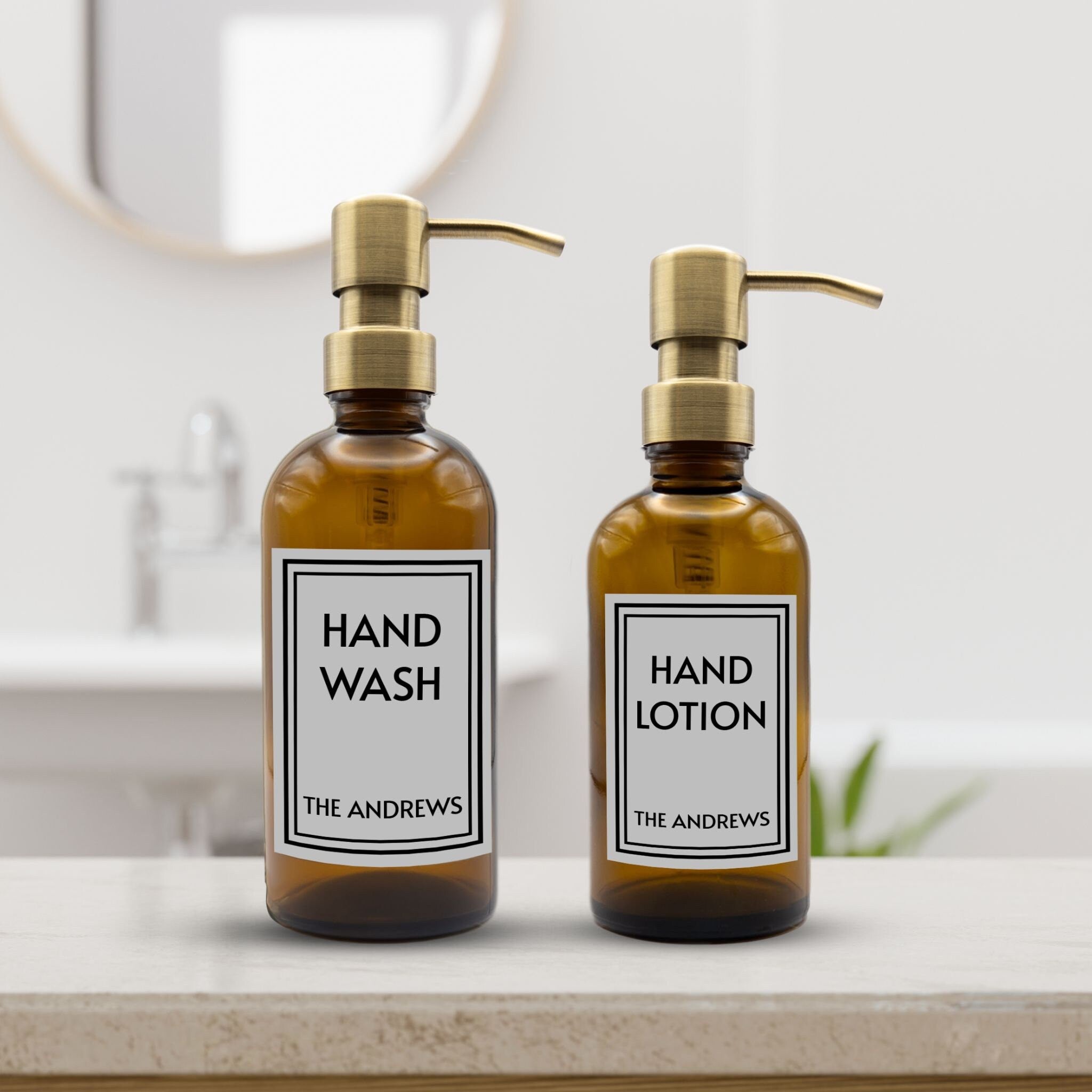 Vegan amber glass dispenser bottles for bathroom or kitchen with custom waterproof labels and gold pump